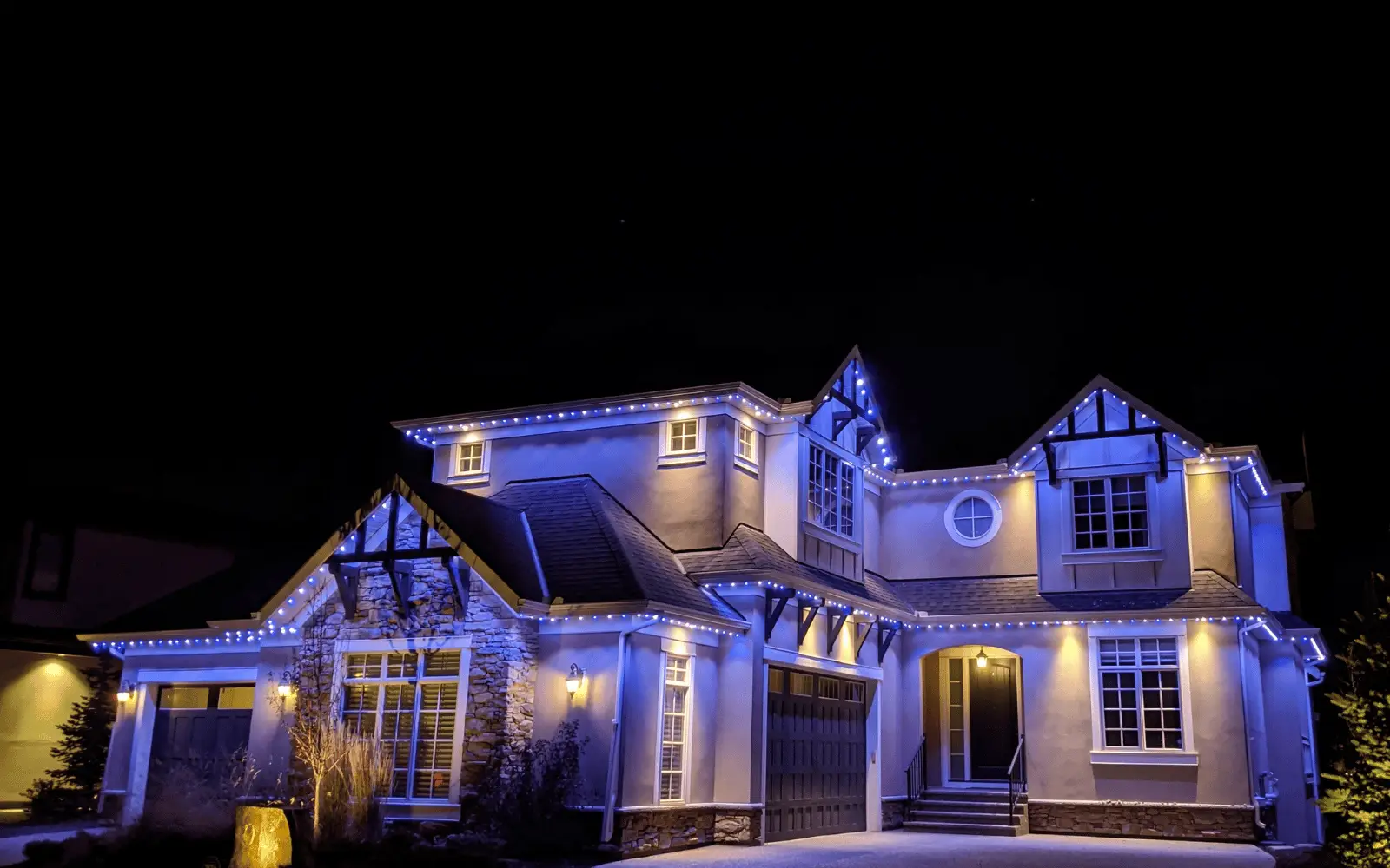 Heritage Home in Calgary — landscape permanent LED lighting installation by Allure Lighting